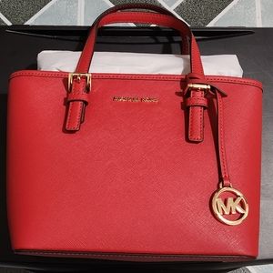 Brand New Michael Kors Jet Set Travel Extra-Small Saffiano Flame Red